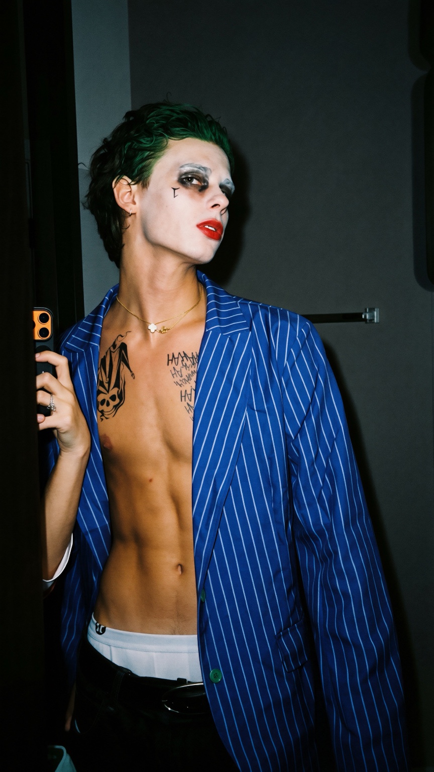 Benny in a blue striped Joker costume
